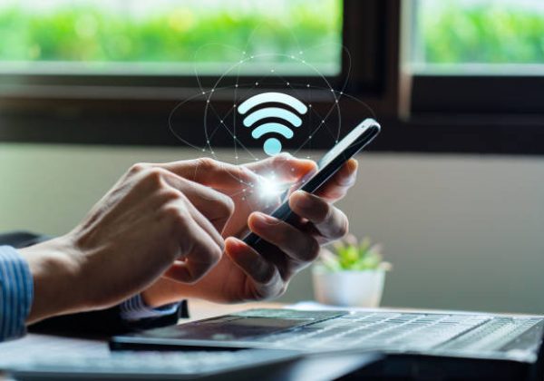 Wifi internet access concept, Business people connect WiFi technology. connect instantly via smartphone and high-speed hotspot. Fast internet wifi hotspot sharing. Working with various applications